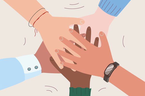 Hands Of Diverse Group Of People Putting Together. Concept Of Co